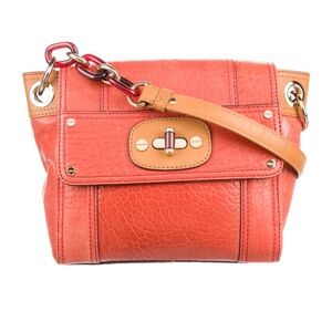 Milly orange leather purse.